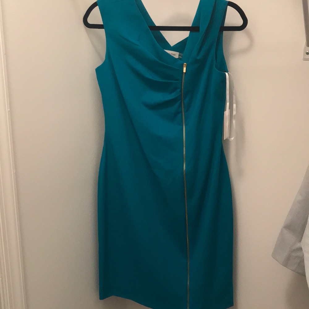 Brand new Calvin Klein dress with gold zipper